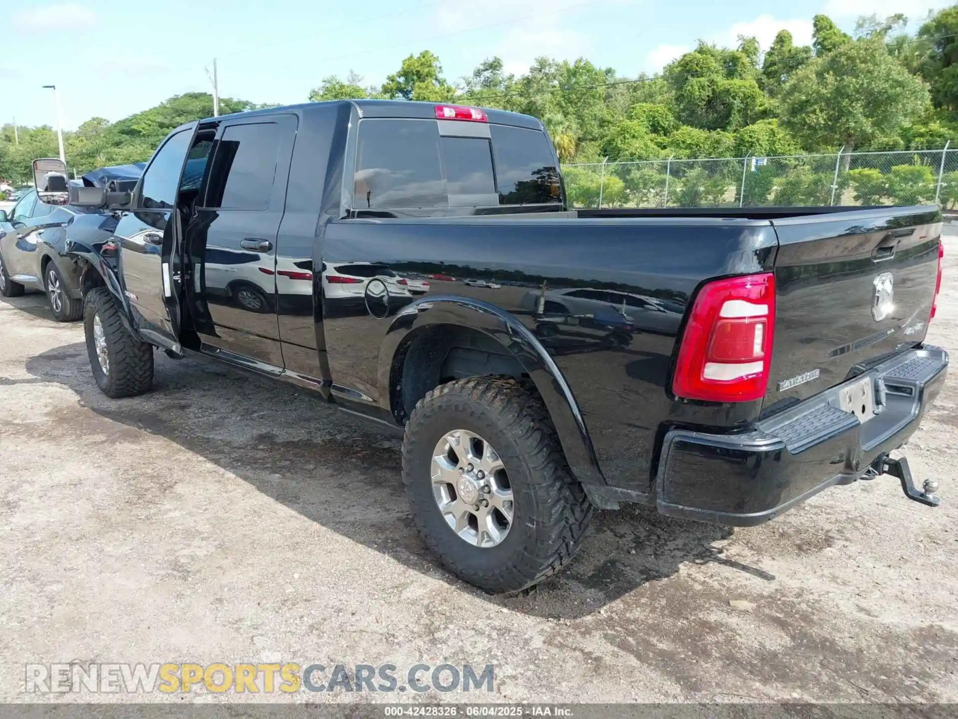 3 Photograph of a damaged car 3C6UR5NL4MG677827 RAM 2500 2021