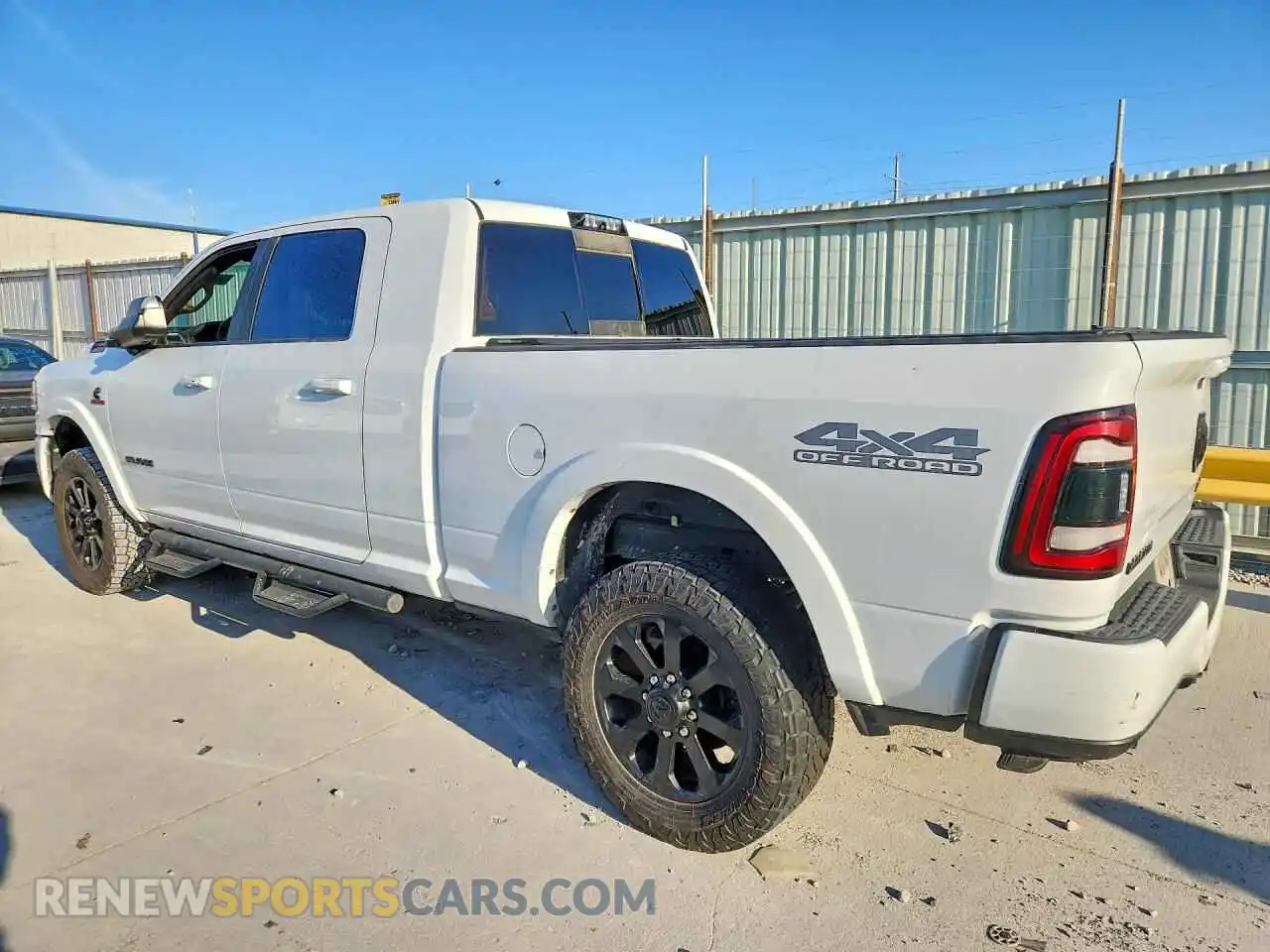 2 Photograph of a damaged car 3C6UR5NL8MG524352 RAM 2500 2021