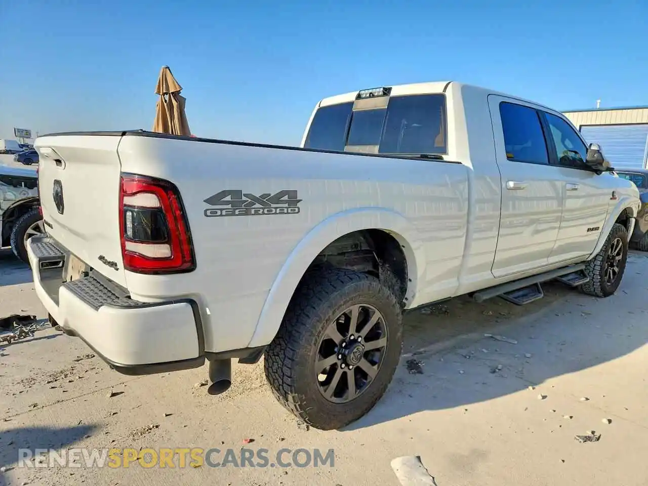 3 Photograph of a damaged car 3C6UR5NL8MG524352 RAM 2500 2021
