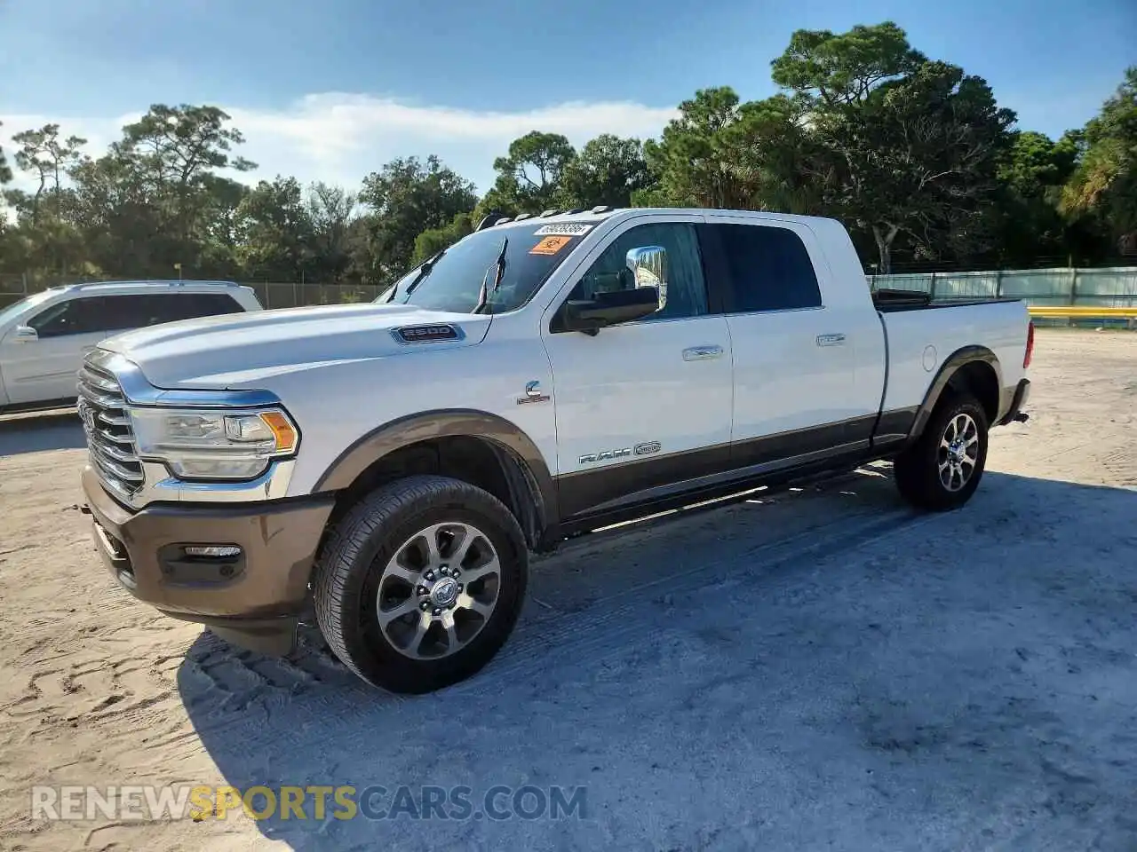 1 Photograph of a damaged car 3C6UR5PL2MG675457 RAM 2500 2021
