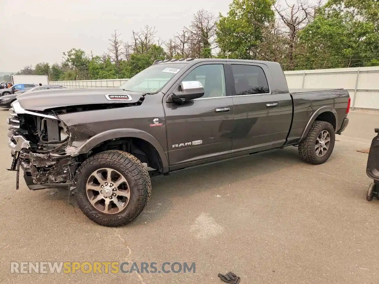 1 Photograph of a damaged car 3C6UR5PL4MG597330 RAM 2500 2021