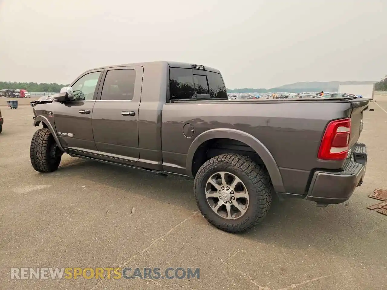 2 Photograph of a damaged car 3C6UR5PL4MG597330 RAM 2500 2021
