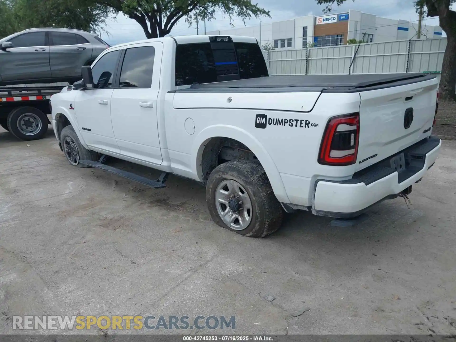 3 Photograph of a damaged car 3C6UR5SL8MG531354 RAM 2500 2021