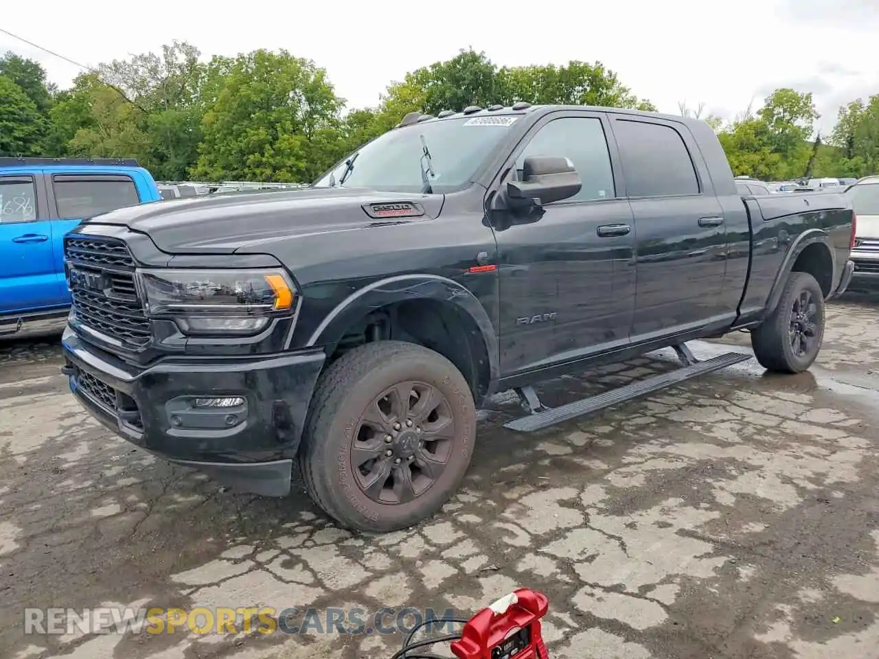 1 Photograph of a damaged car 3C6UR5TL3MG606010 RAM 2500 2021