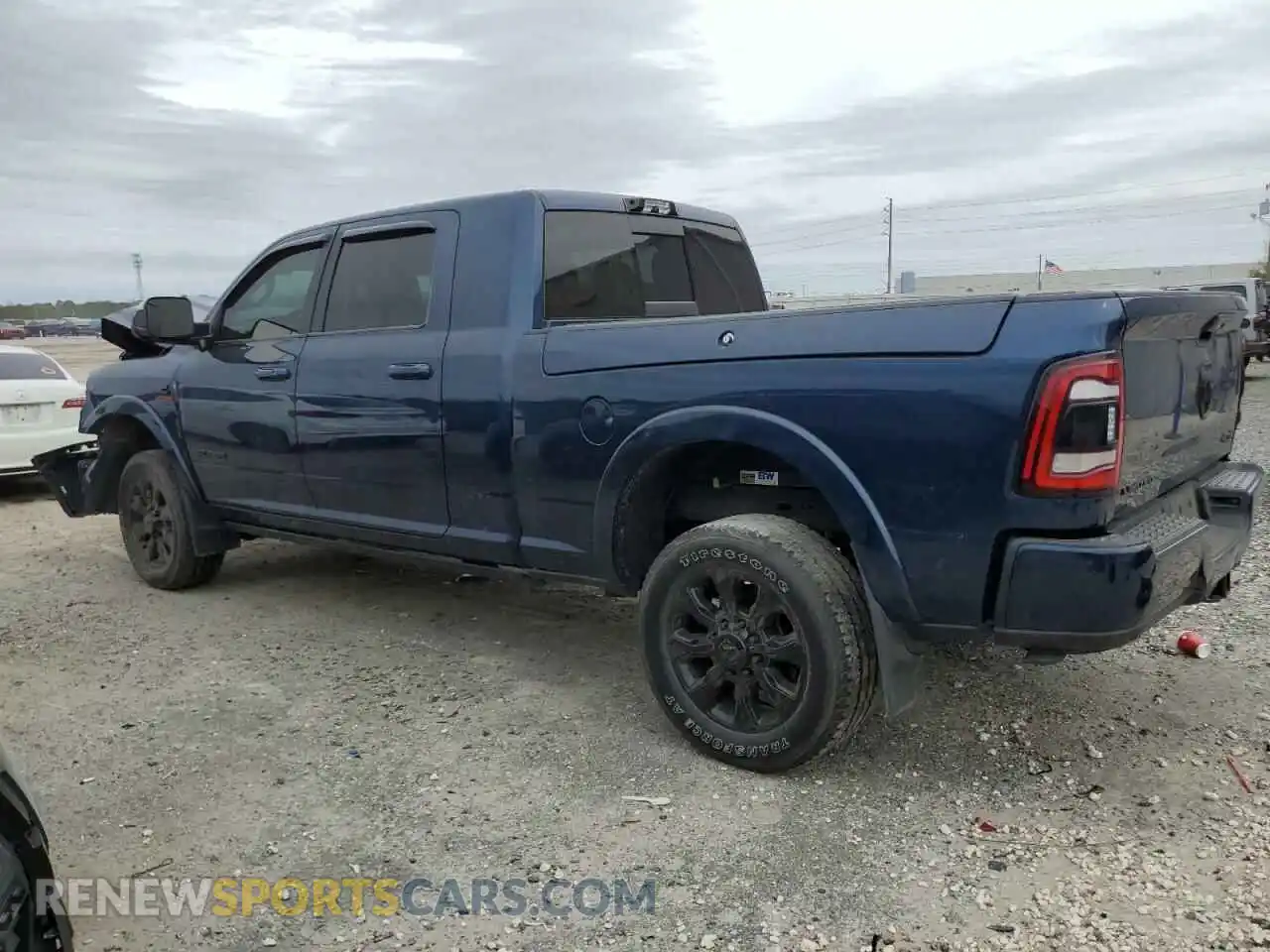 2 Photograph of a damaged car 3C6UR5TL4MG606016 RAM 2500 2021