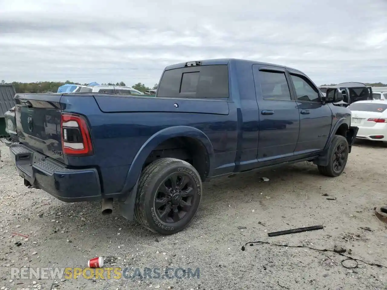 3 Photograph of a damaged car 3C6UR5TL4MG606016 RAM 2500 2021
