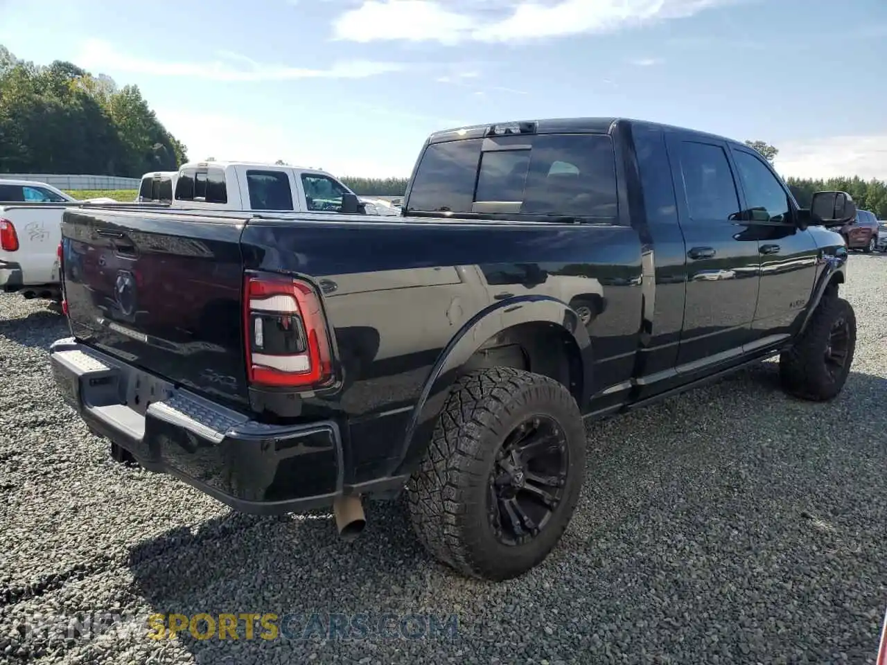 3 Photograph of a damaged car 3C6UR5TL6MG510064 RAM 2500 2021