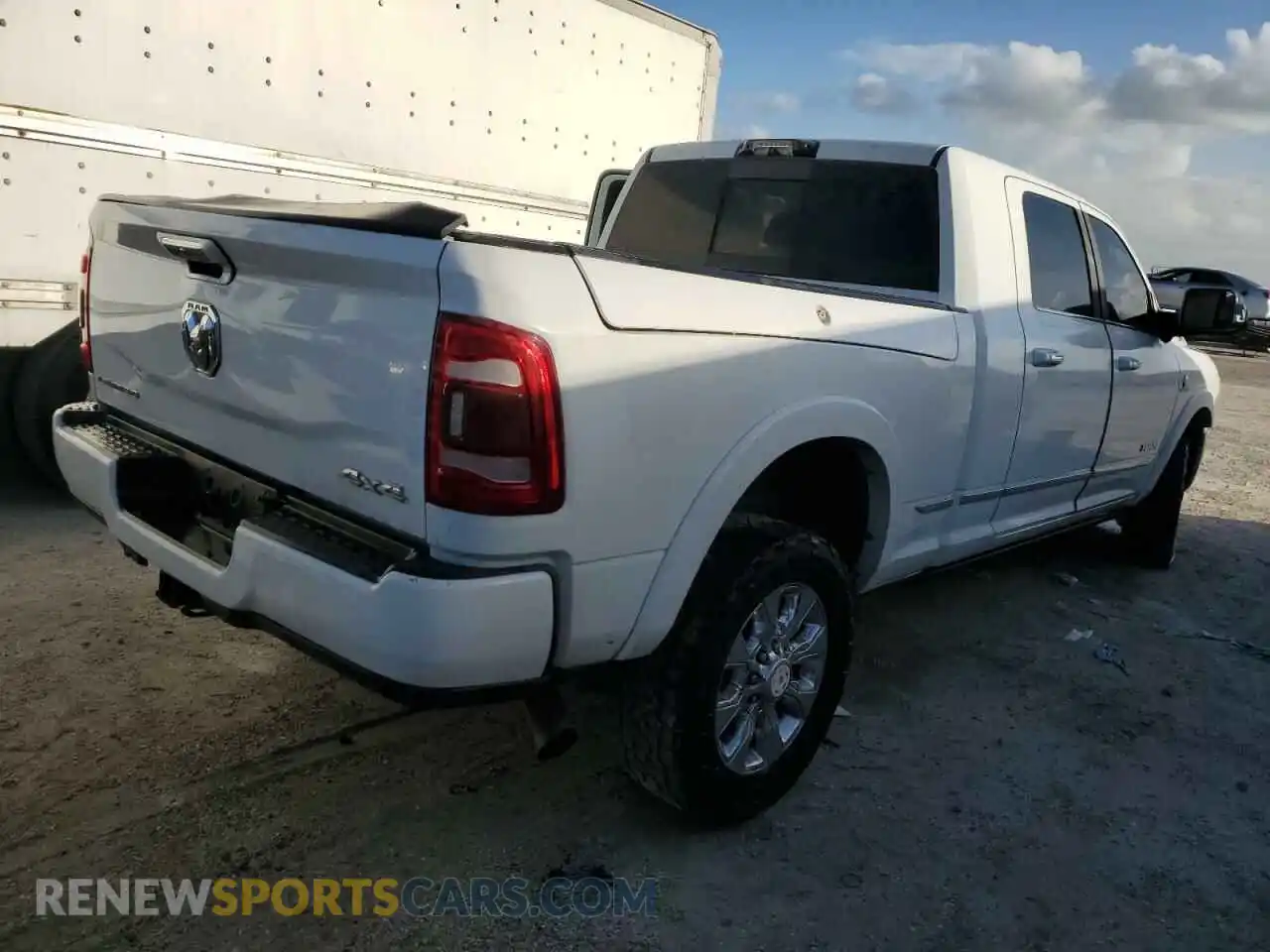 3 fotografías del automóvil dañado 3C6UR5TL8MG501236 RAM 2500 2021