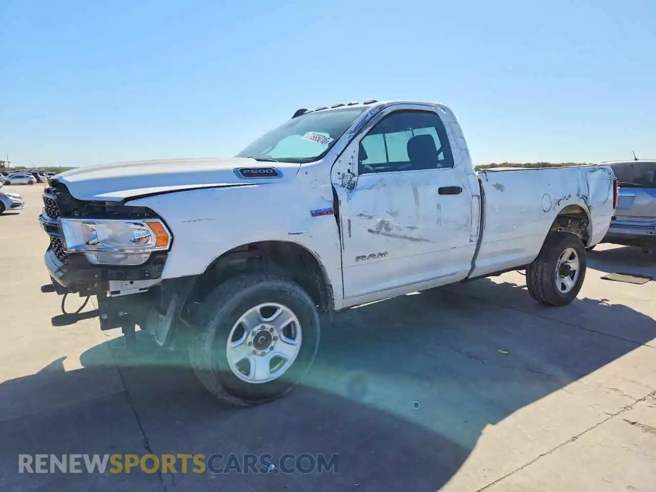1 Photograph of a damaged car 3C6MR5AJ0NG106082 RAM 2500 2022