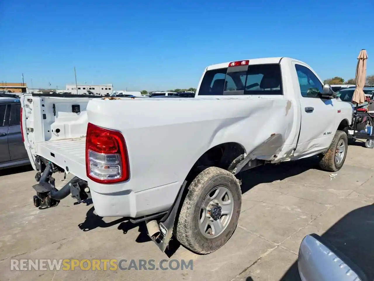 3 Photograph of a damaged car 3C6MR5AJ0NG106082 RAM 2500 2022
