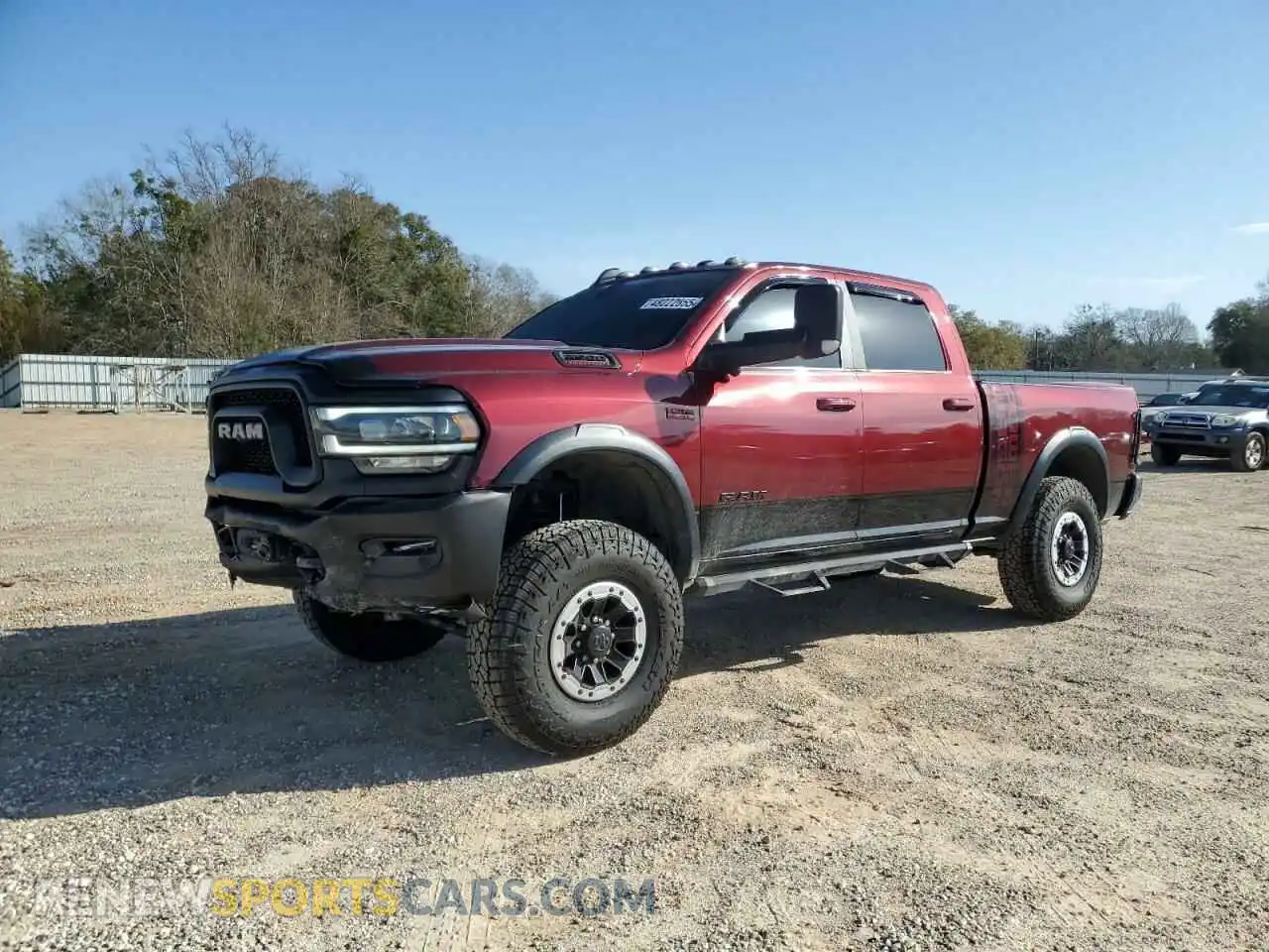 1 Photograph of a damaged car 3C6TR5EJ2NG111256 RAM 2500 2022
