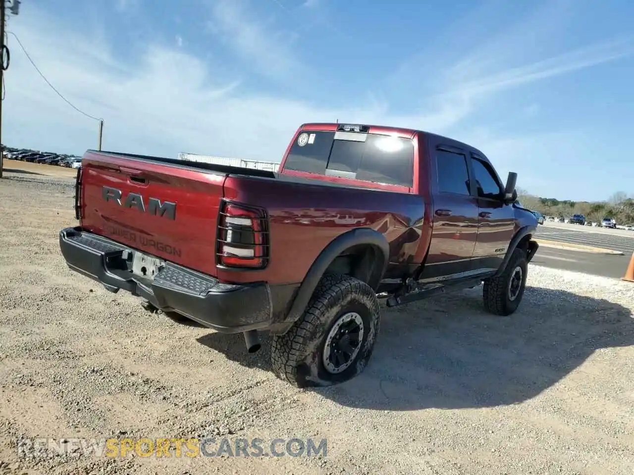 3 Photograph of a damaged car 3C6TR5EJ2NG111256 RAM 2500 2022