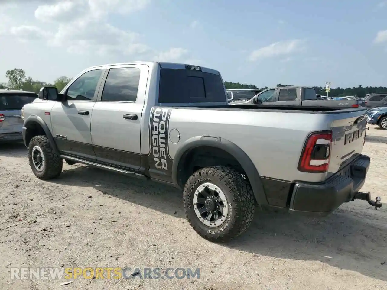 2 Photograph of a damaged car 3C6TR5EJ3NG369009 RAM 2500 2022