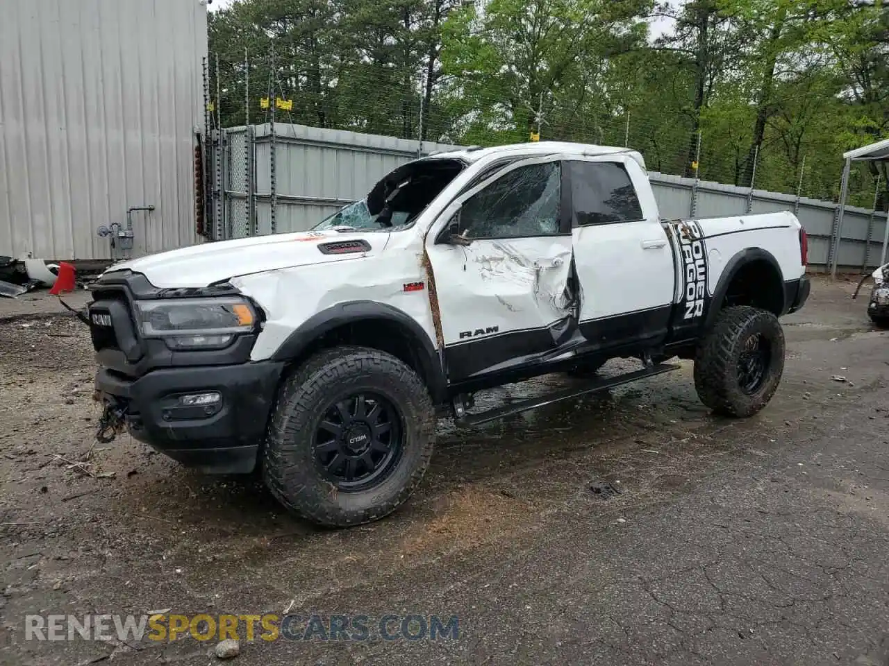 1 Photograph of a damaged car 3C6TR5EJ9NG222841 RAM 2500 2022