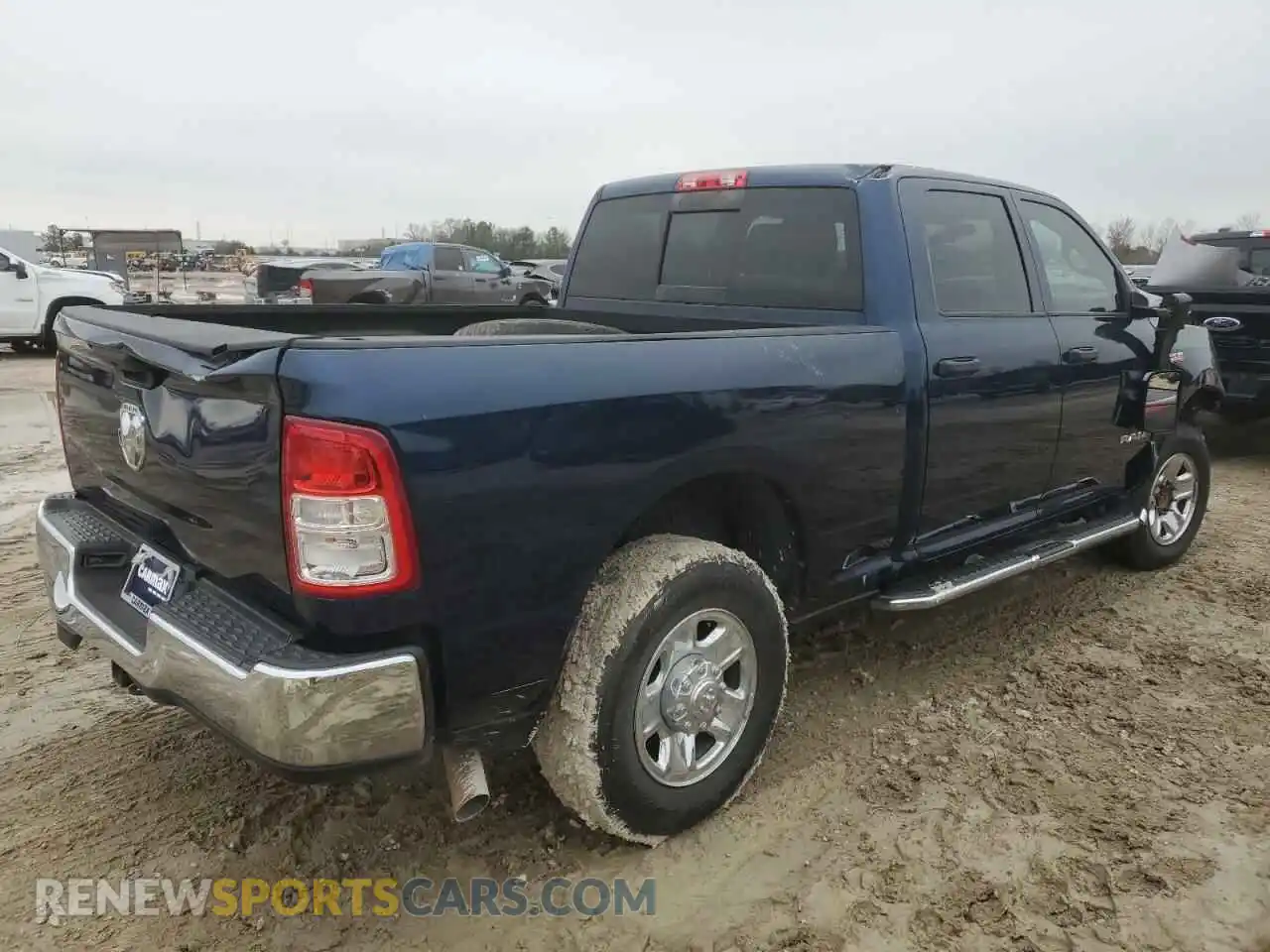 3 Photograph of a damaged car 3C6UR4CJ4NG102804 RAM 2500 2022