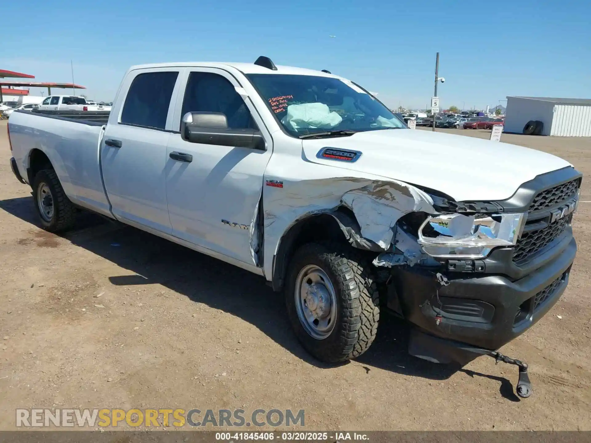 1 Photograph of a damaged car 3C6UR4HJ0NG410075 RAM 2500 2022