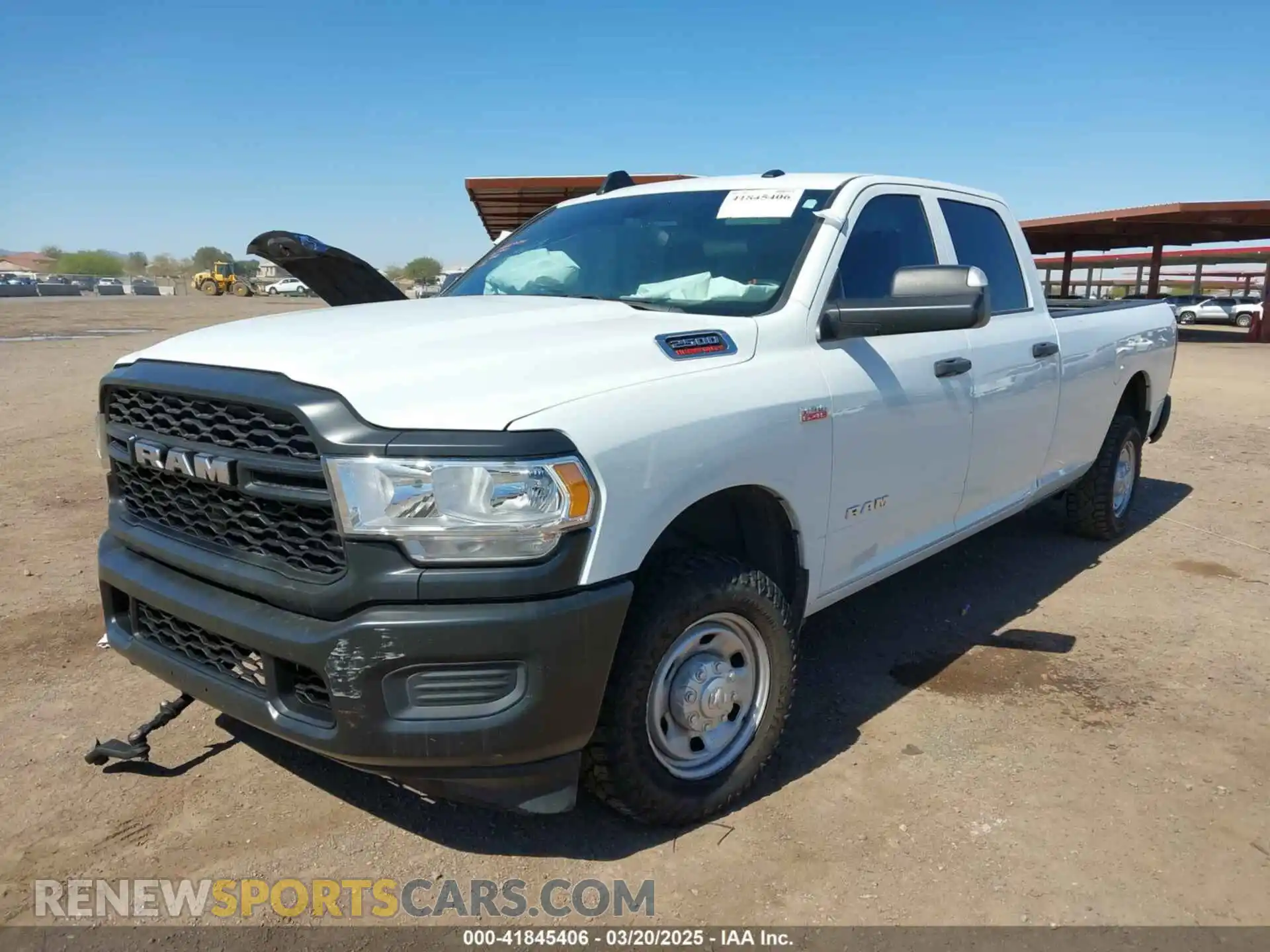 2 Photograph of a damaged car 3C6UR4HJ0NG410075 RAM 2500 2022