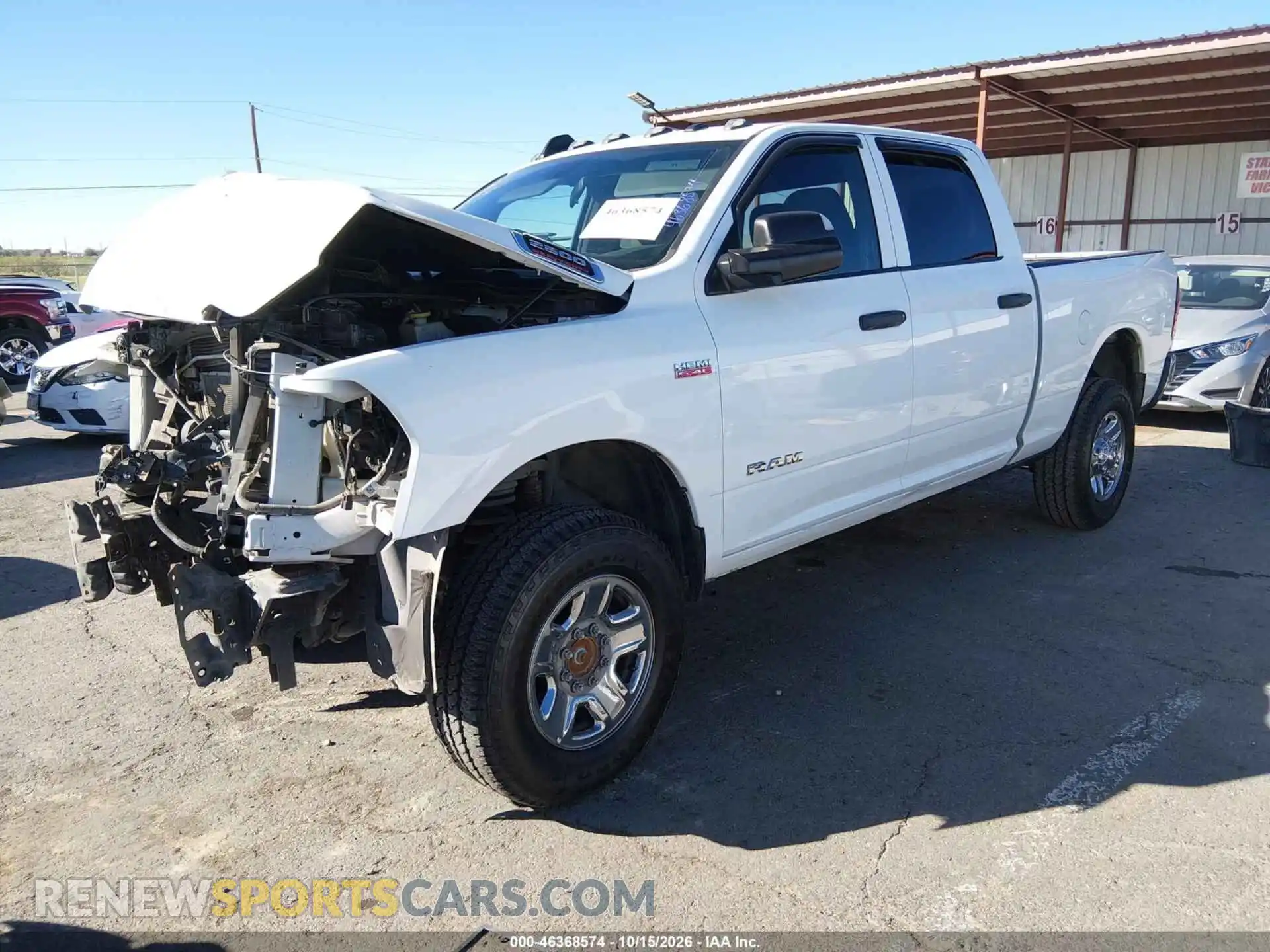 2 Photograph of a damaged car 3C6UR5CJ0NG232505 RAM 2500 2022