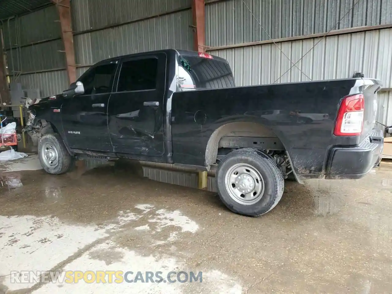 2 Photograph of a damaged car 3C6UR5CJ0NG359559 RAM 2500 2022