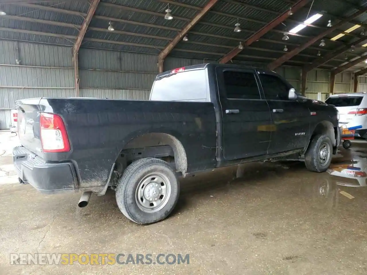 3 Photograph of a damaged car 3C6UR5CJ0NG359559 RAM 2500 2022