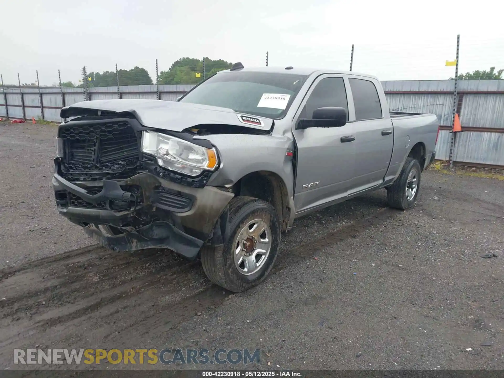 2 Photograph of a damaged car 3C6UR5CJ2NG253565 RAM 2500 2022