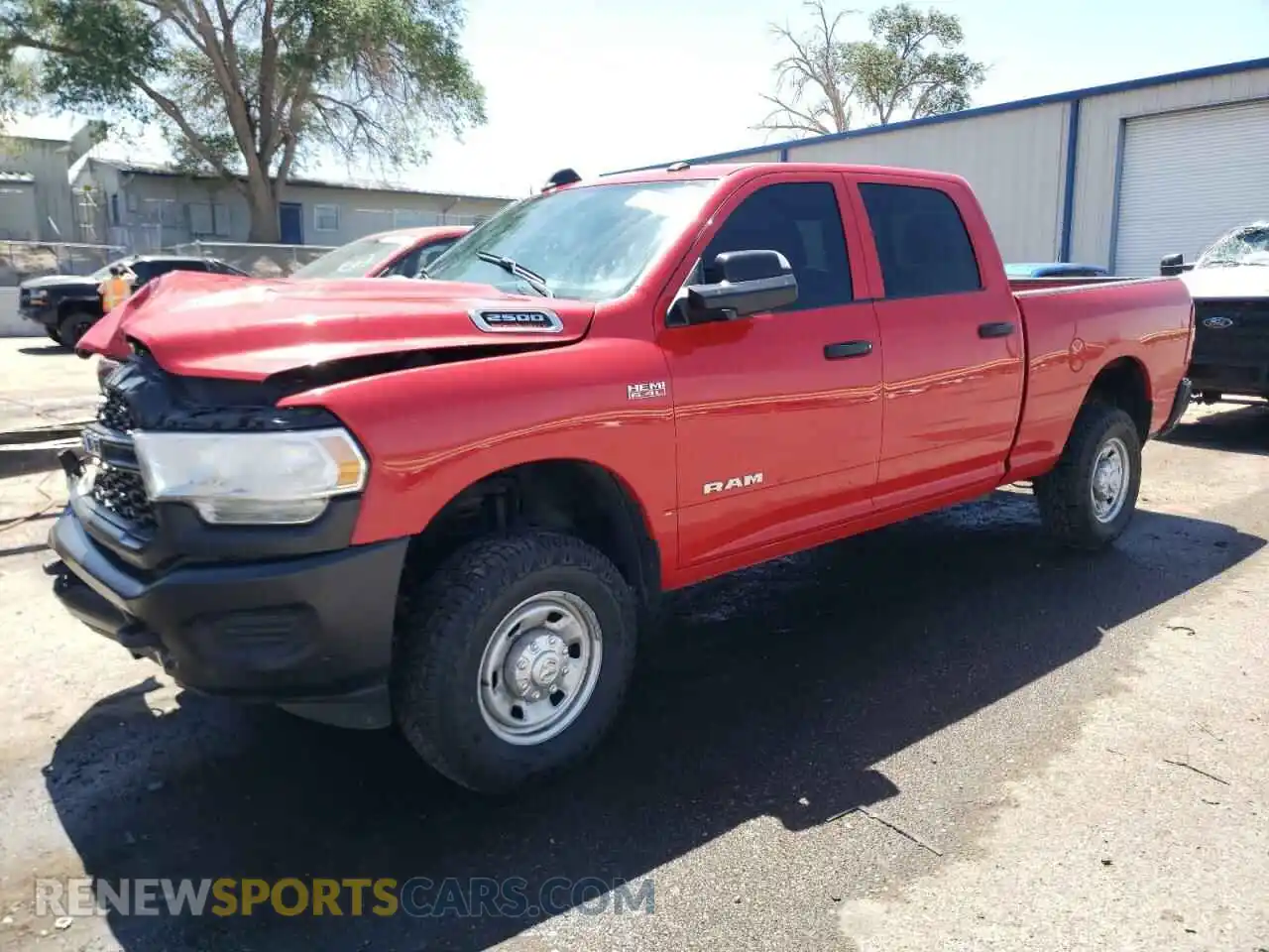 1 Photograph of a damaged car 3C6UR5CJ2NG305552 RAM 2500 2022