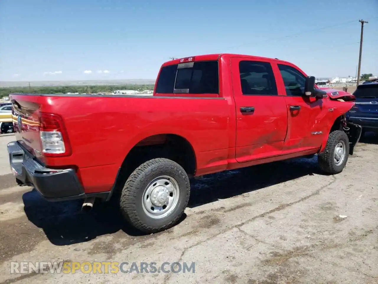 3 Photograph of a damaged car 3C6UR5CJ2NG305552 RAM 2500 2022