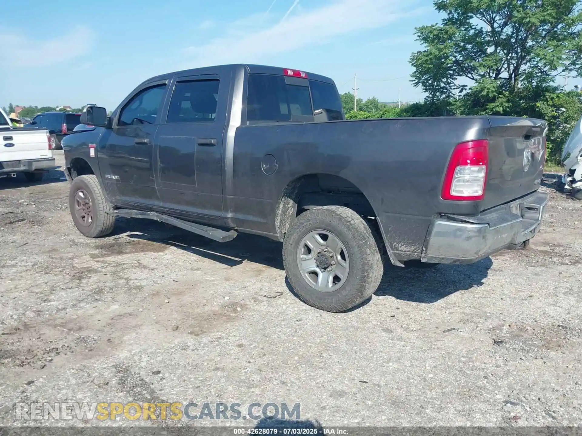 3 Photograph of a damaged car 3C6UR5CJ8NG286439 RAM 2500 2022