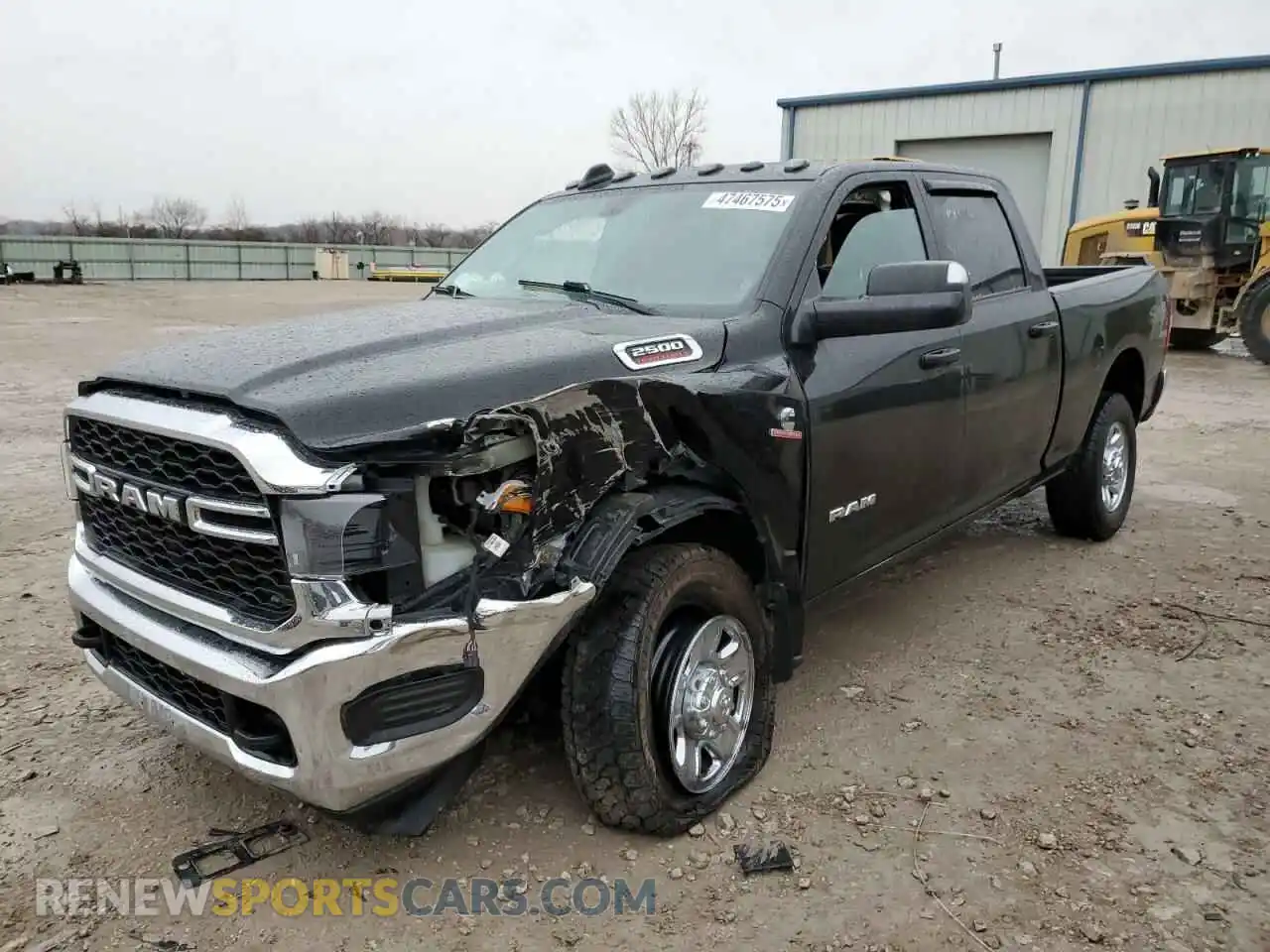 1 Photograph of a damaged car 3C6UR5CL1NG252490 RAM 2500 2022