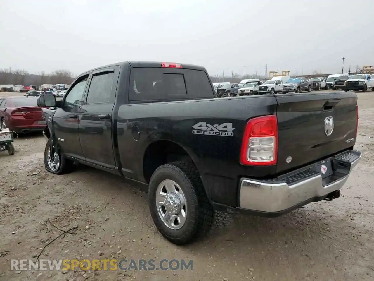 2 Photograph of a damaged car 3C6UR5CL1NG252490 RAM 2500 2022