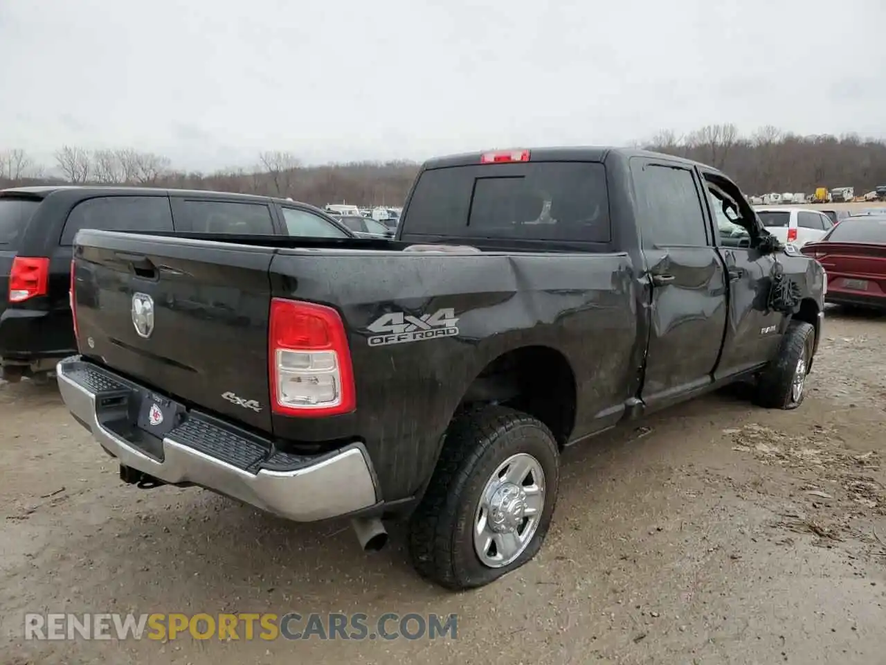 3 Photograph of a damaged car 3C6UR5CL1NG252490 RAM 2500 2022