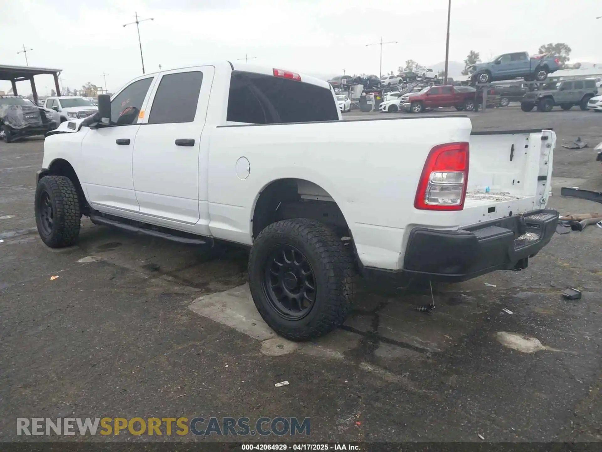 3 Photograph of a damaged car 3C6UR5CL1NG438188 RAM 2500 2022