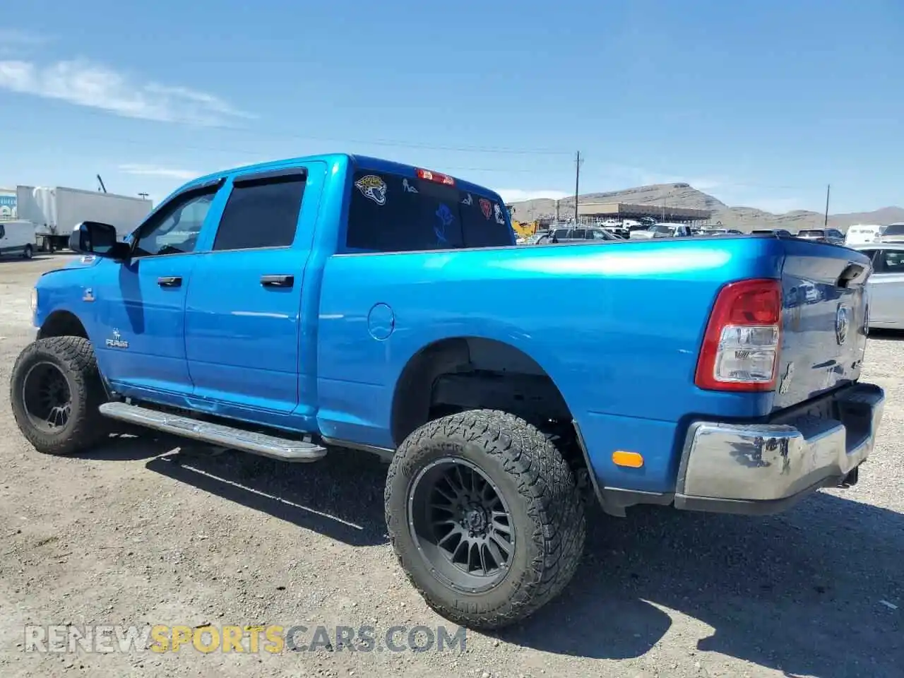 2 Photograph of a damaged car 3C6UR5CL2NG125490 RAM 2500 2022