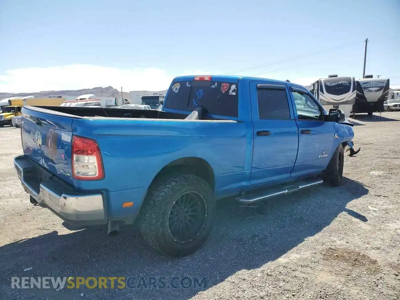 3 Photograph of a damaged car 3C6UR5CL2NG125490 RAM 2500 2022