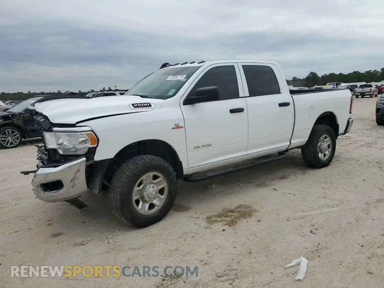 1 Photograph of a damaged car 3C6UR5CL2NG209079 RAM 2500 2022