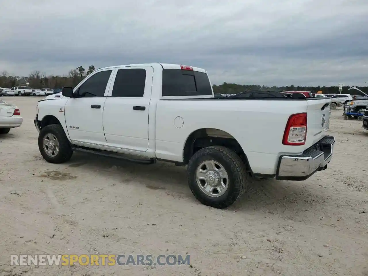 2 Photograph of a damaged car 3C6UR5CL2NG209079 RAM 2500 2022