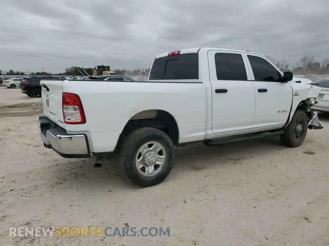 3 Photograph of a damaged car 3C6UR5CL2NG209079 RAM 2500 2022