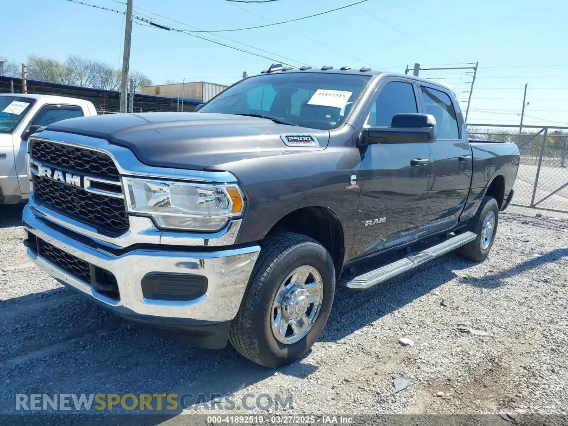 2 Photograph of a damaged car 3C6UR5CL2NG252546 RAM 2500 2022