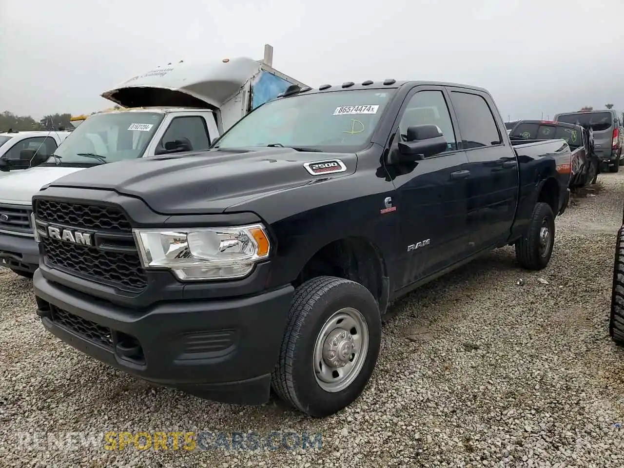 1 Photograph of a damaged car 3C6UR5CL3NG159857 RAM 2500 2022