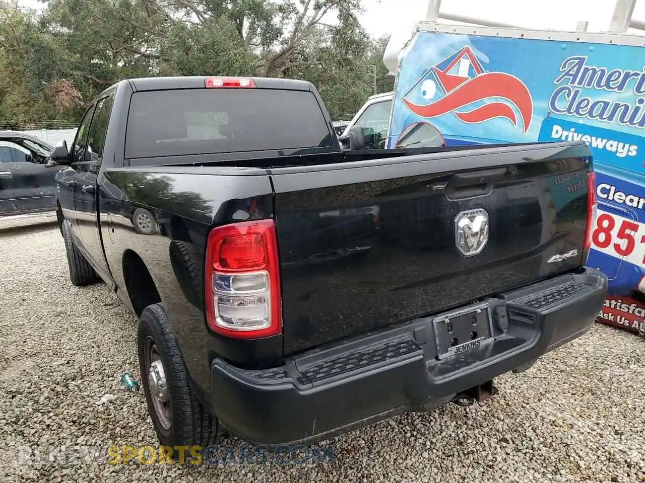 2 Photograph of a damaged car 3C6UR5CL3NG159857 RAM 2500 2022