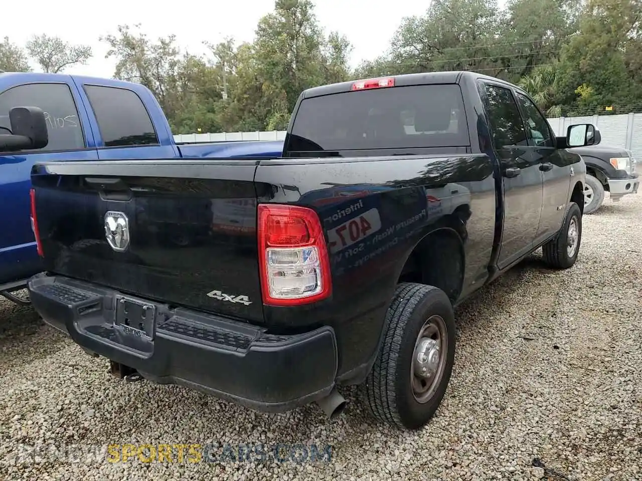 3 Photograph of a damaged car 3C6UR5CL3NG159857 RAM 2500 2022