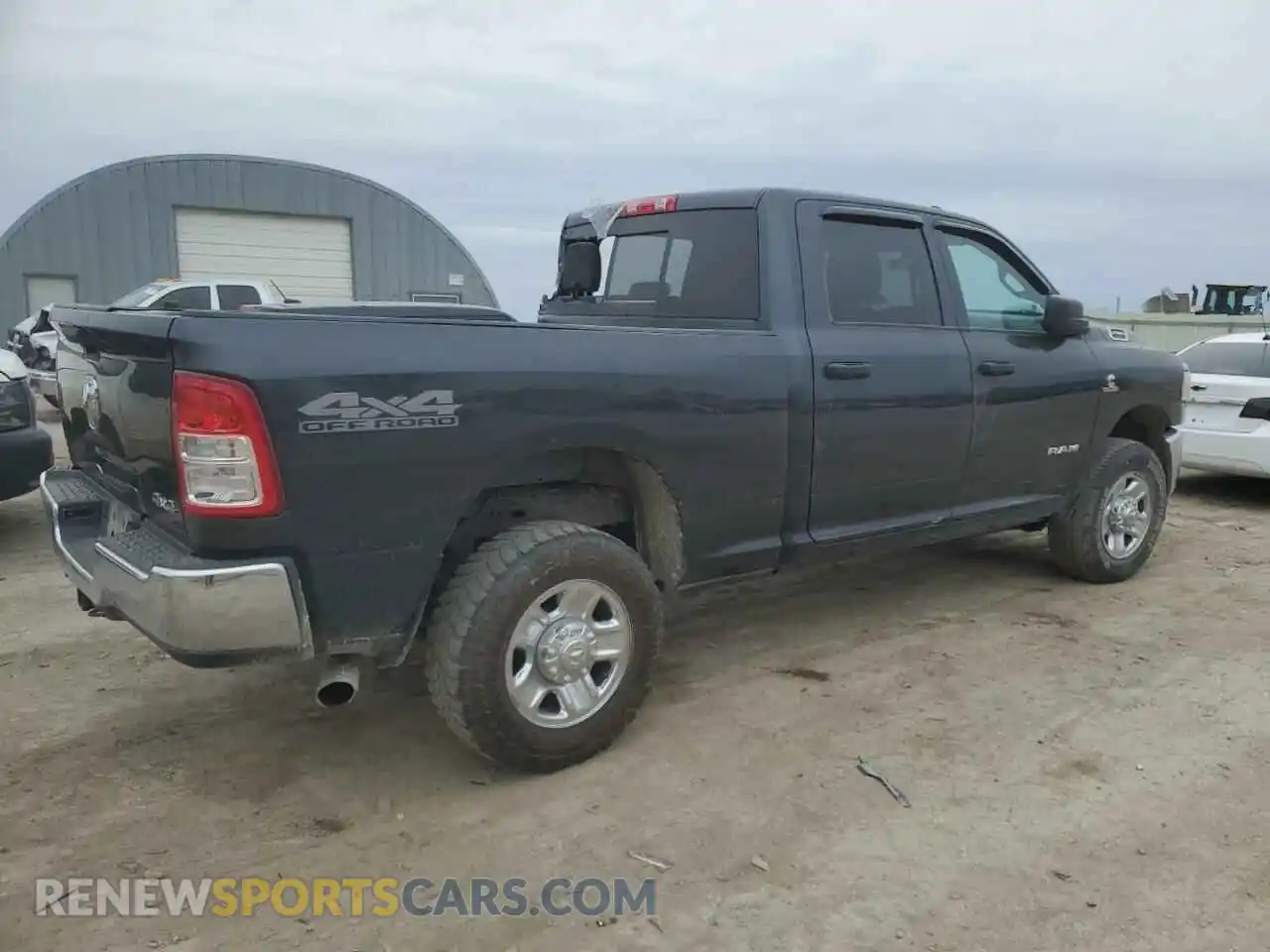 3 Photograph of a damaged car 3C6UR5CL3NG220608 RAM 2500 2022