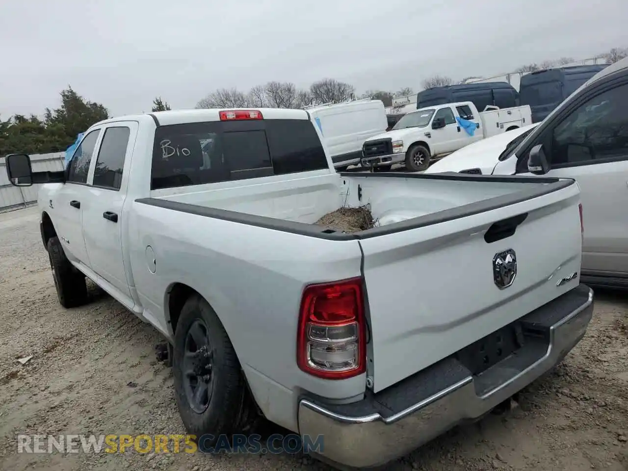 2 Photograph of a damaged car 3C6UR5CL3NG394405 RAM 2500 2022