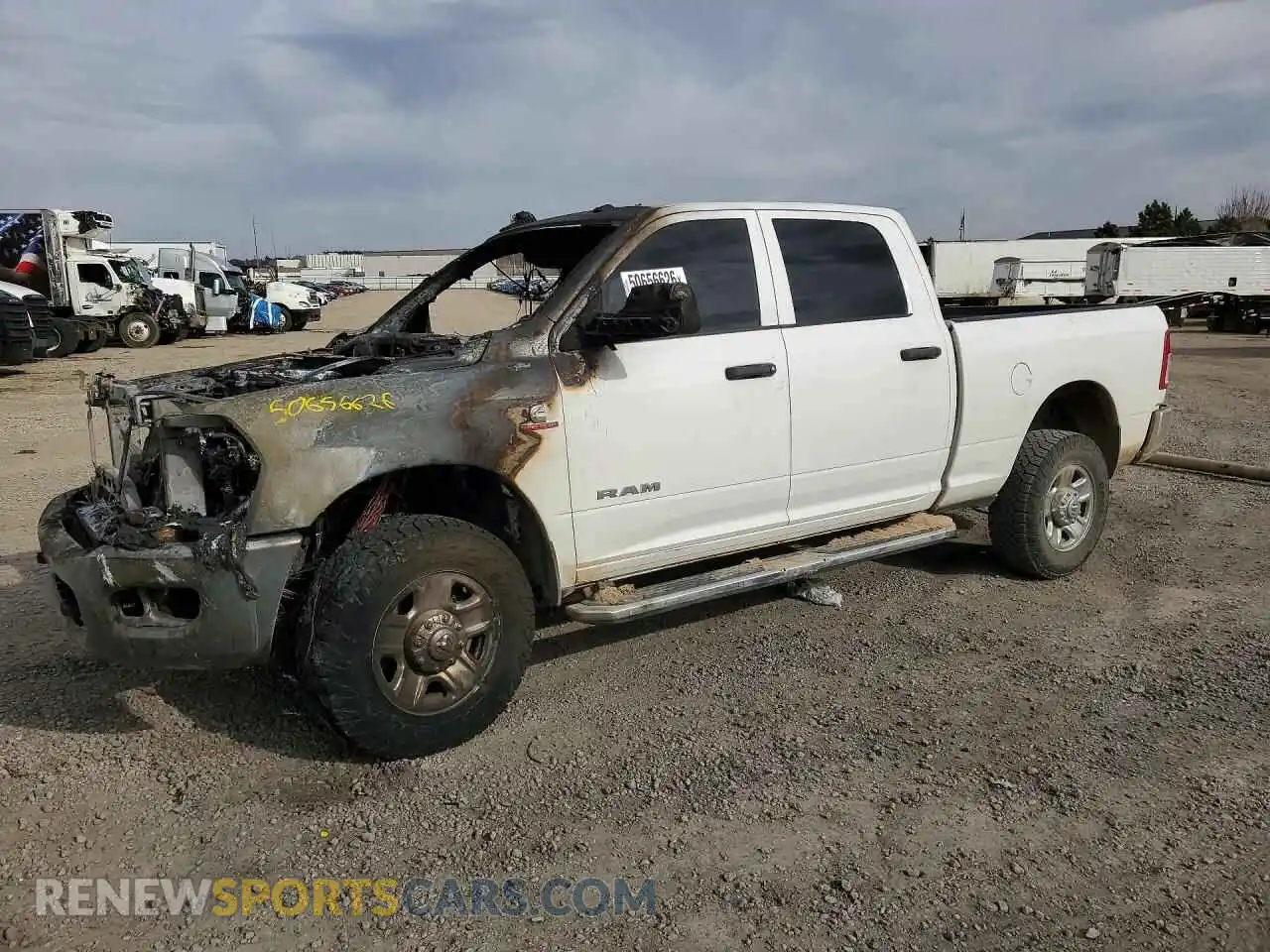 1 Photograph of a damaged car 3C6UR5CL6NG215449 RAM 2500 2022