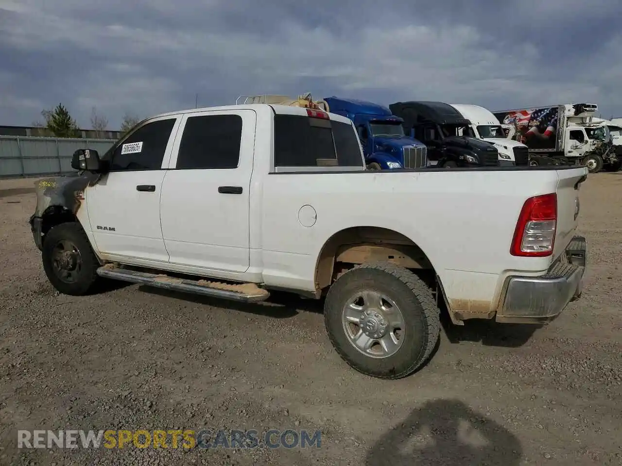 2 Photograph of a damaged car 3C6UR5CL6NG215449 RAM 2500 2022