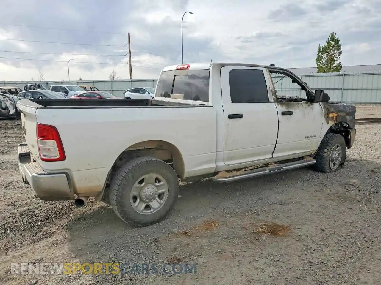 3 Photograph of a damaged car 3C6UR5CL6NG215449 RAM 2500 2022