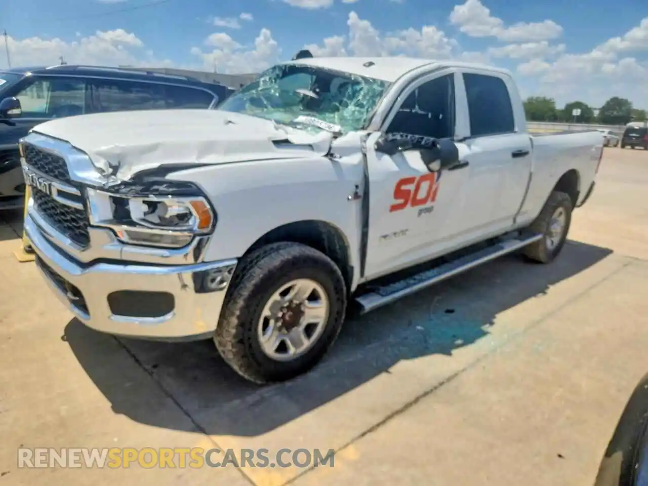 1 Photograph of a damaged car 3C6UR5CL7NG118969 RAM 2500 2022