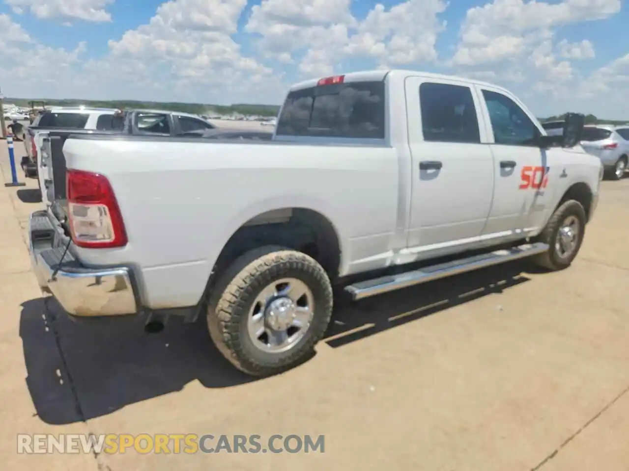 3 Photograph of a damaged car 3C6UR5CL7NG118969 RAM 2500 2022