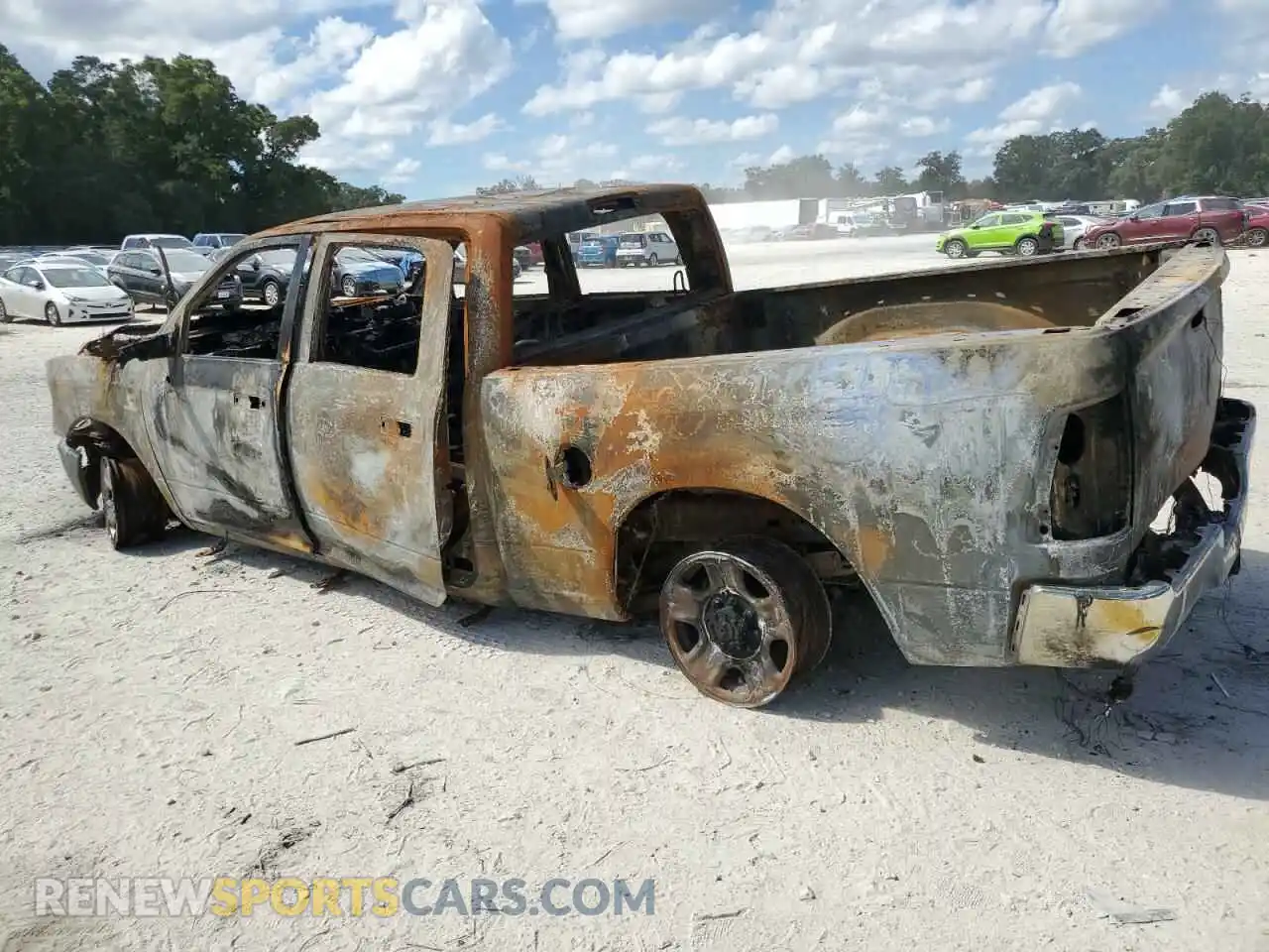 2 Photograph of a damaged car 3C6UR5CL7NG401288 RAM 2500 2022
