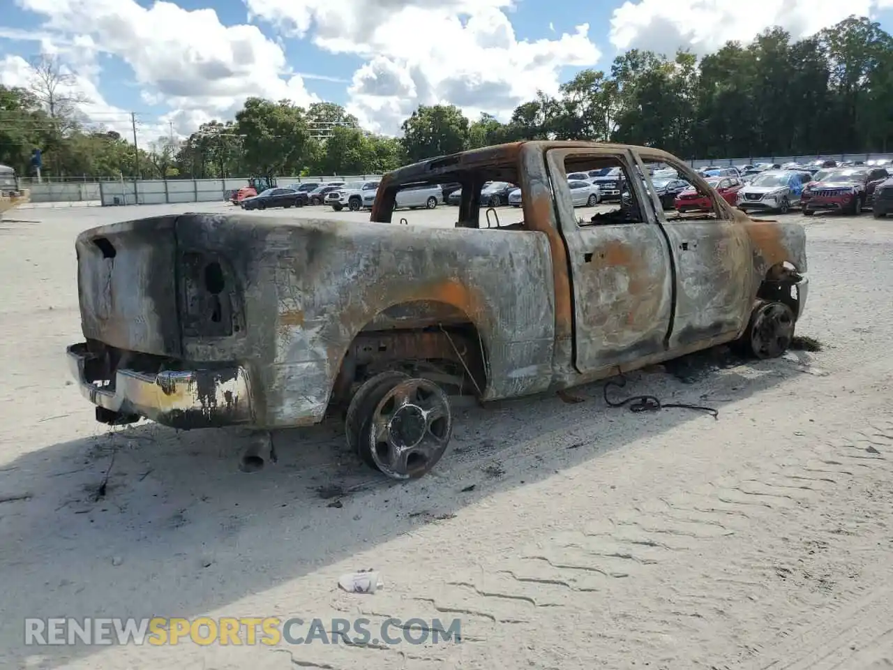 3 Photograph of a damaged car 3C6UR5CL7NG401288 RAM 2500 2022